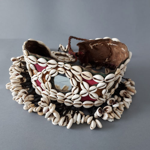 Dogon belt with mirrors and adorned with cowrie shells worn for ceremonies.