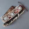 Dogon belt with mirrors and adorned with cowrie shells worn for ceremonies.