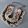 Dogon belt with mirrors and adorned with cowrie shells worn for ceremonies.