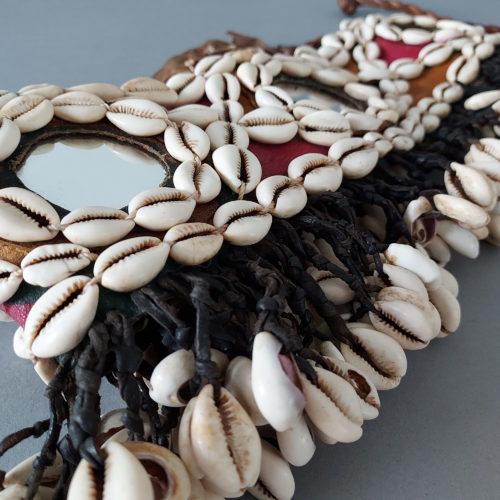 Dogon belt with mirrors and adorned with cowrie shells worn for ceremonies.