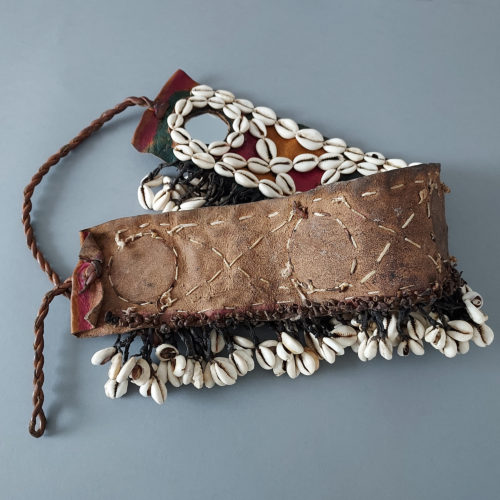 Dogon belt with mirrors and adorned with cowrie shells worn for ceremonies.