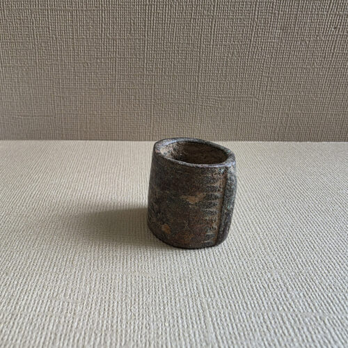 Cylindrical copper alloy bead from West Africa