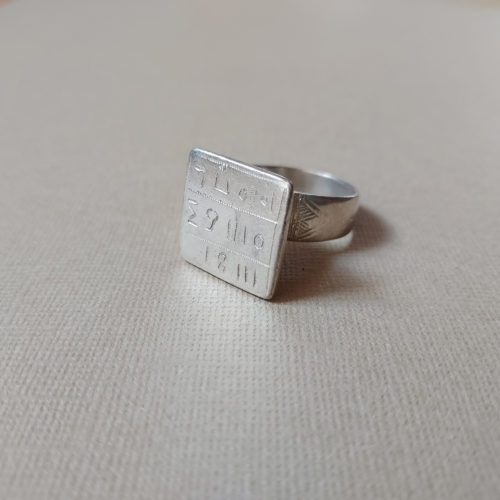 tuareg silver script amulet ring with square face from mali