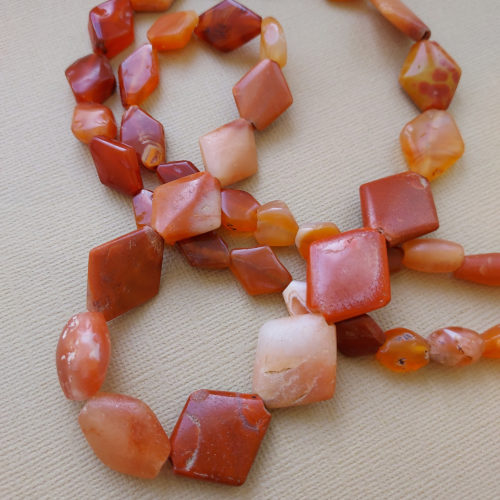 Ancient carnelian stone lozenge shape stone beads from Mali.