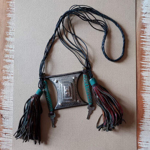 Tuareg silver tcherot amulet with large leather tassels from Niger.