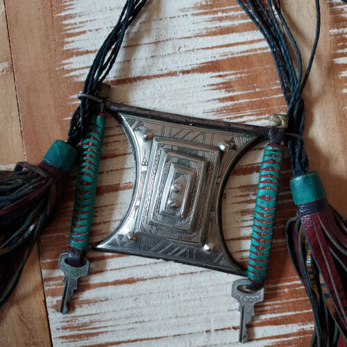 Tuareg silver tcherot amulet with large leather tassels from Niger.