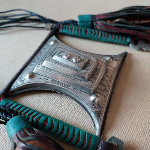 Tuareg silver tcherot amulet with large leather tassels from Niger.