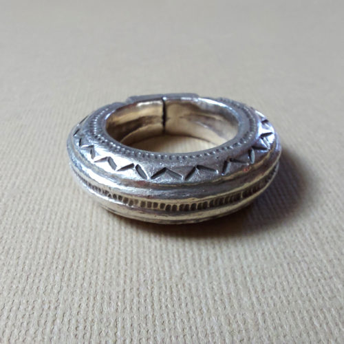 Impressive Fulani decorated silver pendant or ring from Mali.