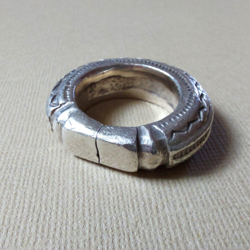 rare and impressive peul fulani decorated silver pendant or ring from mali