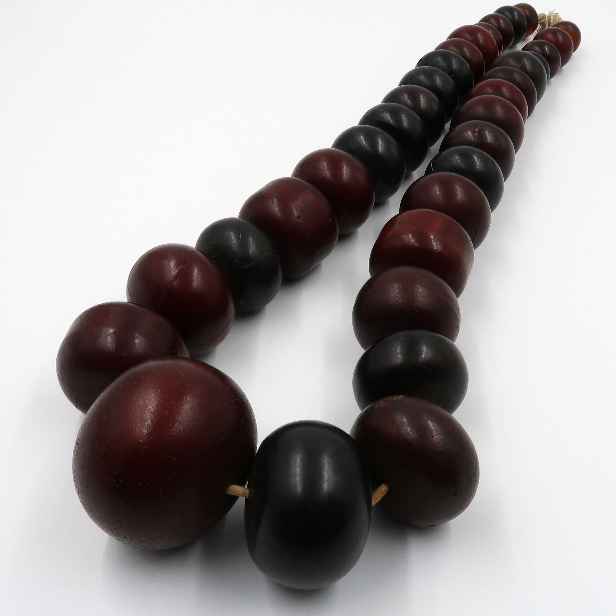 Roseberys London | A cherry amber graduated bead necklace, late 19th