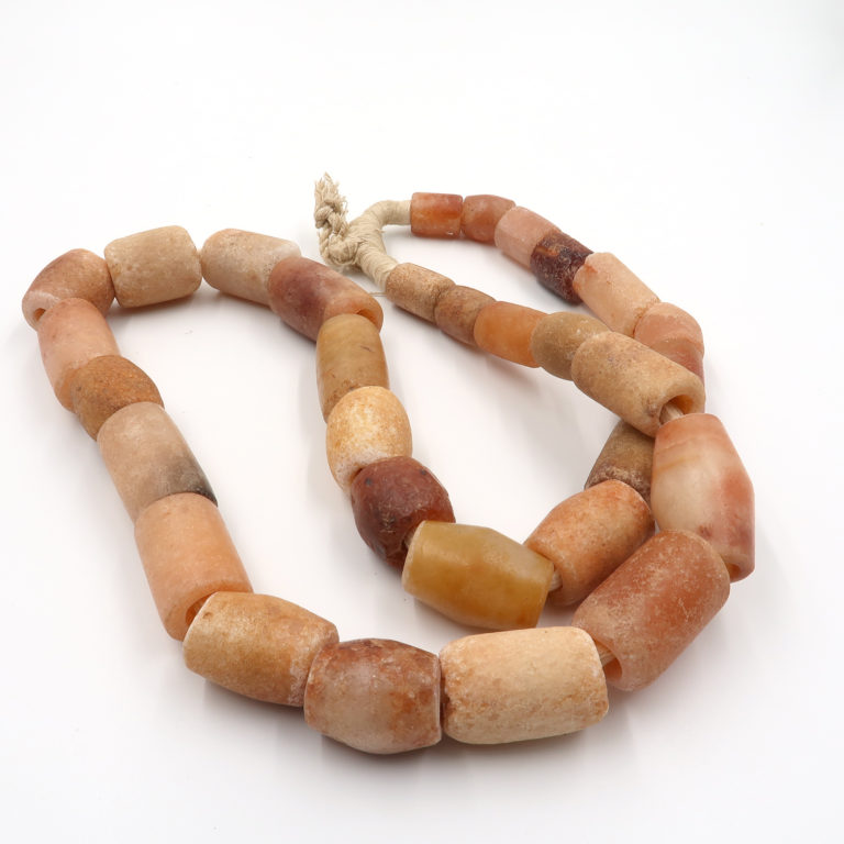 Collector quality Neolithic period quartz and carnelian beads from Mali.