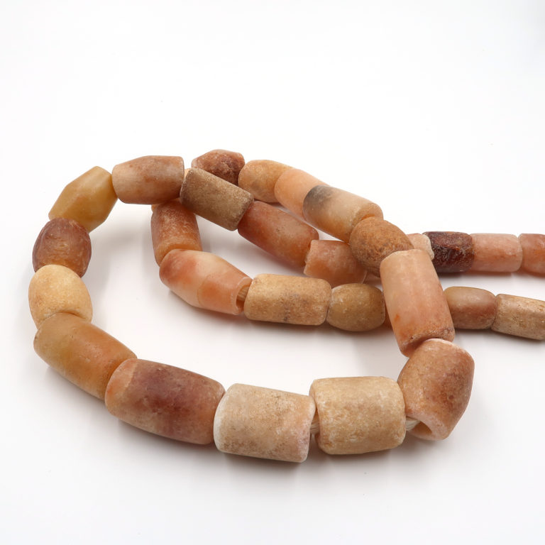 Collector quality Neolithic period quartz and carnelian beads from Mali.