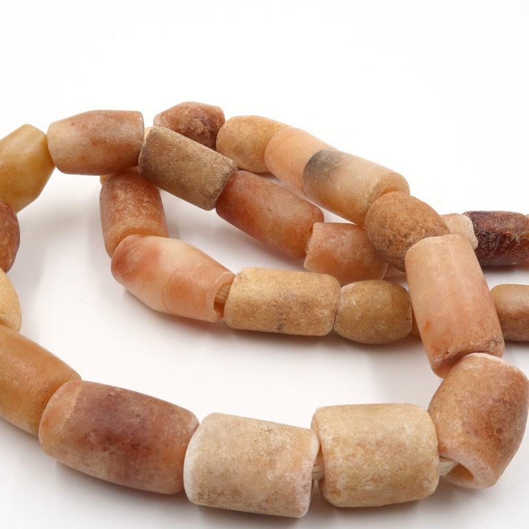 Collector quality Neolithic period quartz and carnelian beads from Mali.