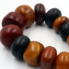 Long strand of phenolic resin amber beads from the African trade.