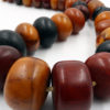 Long strand of phenolic resin amber beads from the African trade.