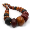 Long strand of phenolic resin amber beads from the African trade.