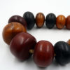 Long strand of phenolic resin amber beads from the African trade.