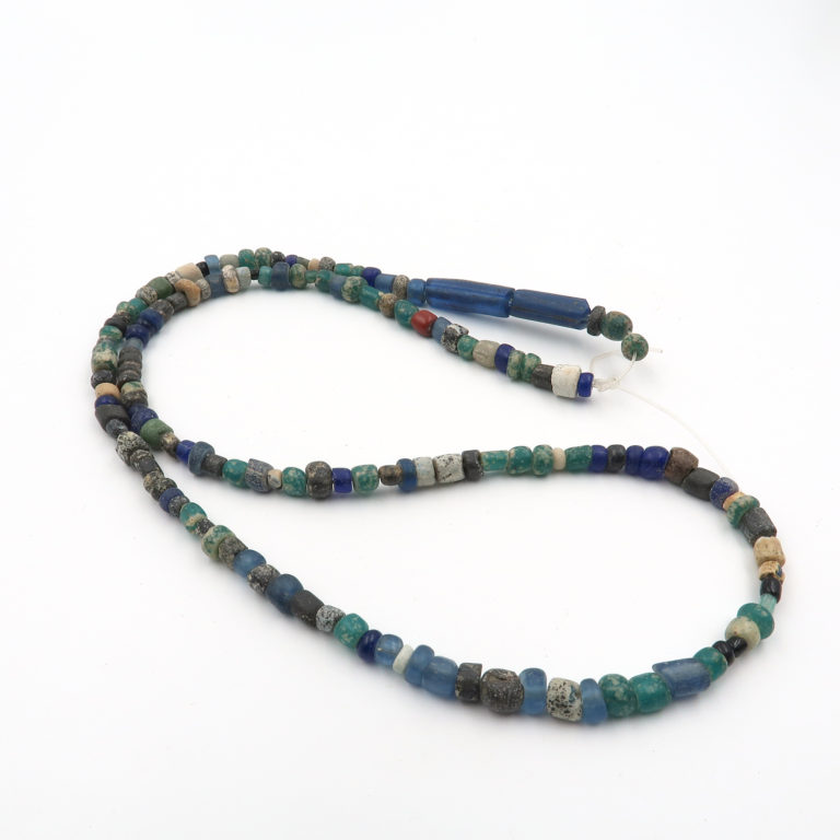 strand of ancient glass burial beads from djenne mali