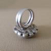Peul ring of round shape with copper amulet.