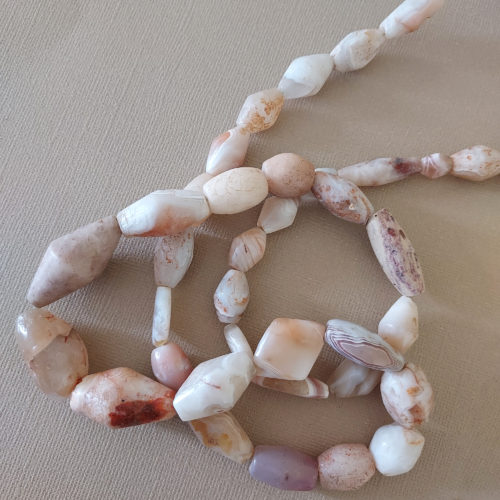 Strand of graduated ancient white quartz beads.