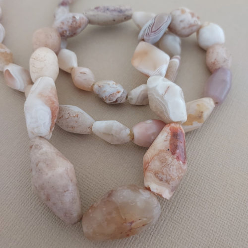 Strand of graduated ancient white quartz beads.