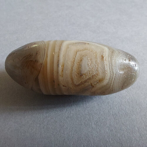 Ancient stone bead of large size.