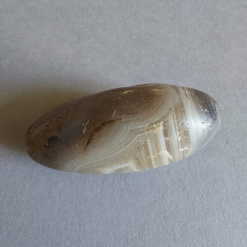 Ancient stone bead of large size.