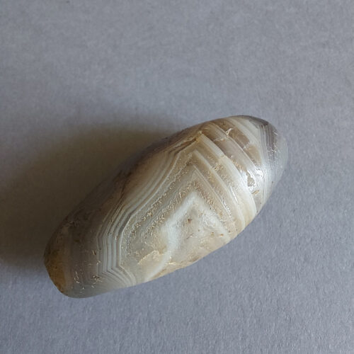 Ancient stone bead of large size.