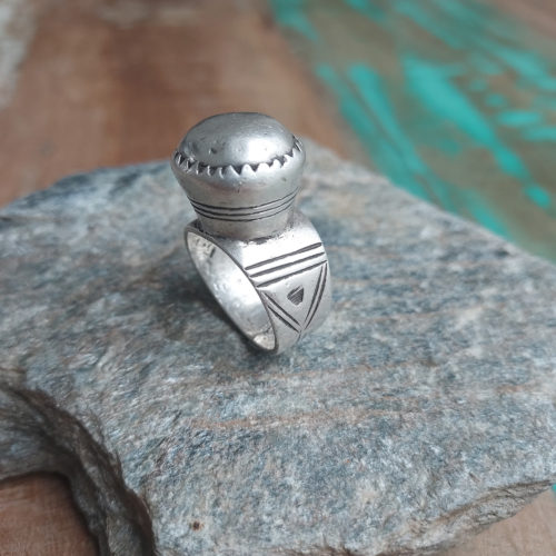 Old Tuareg silver amulet ring with design.