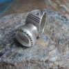 Old Tuareg silver amulet ring with design.