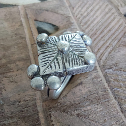 Fulali Peul silver statement ring with lines.