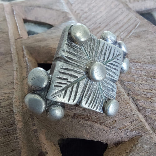 Fulali Peul silver statement ring with lines.