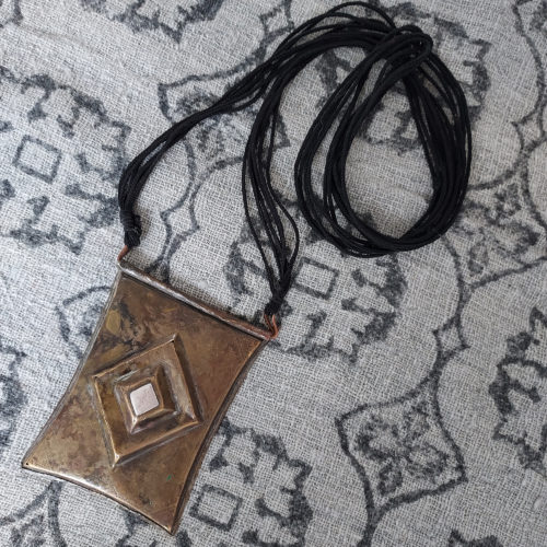 Large Tuareg brass and silver talisman necklace from Mali.