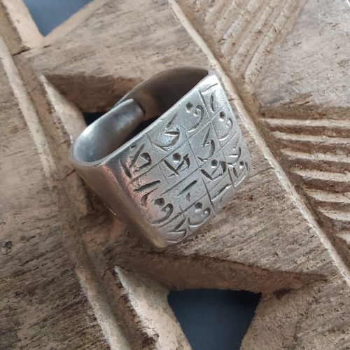 Tuareg silver talisman ring with magic cursive script from Niger.