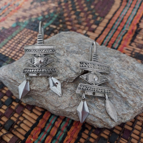 Old Tuareg decorated silver earrings.