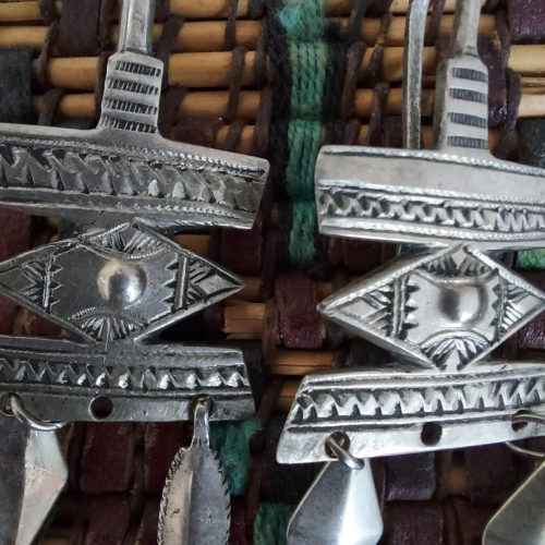 Old Tuareg decorated silver earrings.