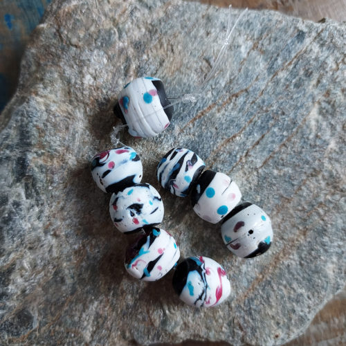 Eight antique Venetian trade beads.