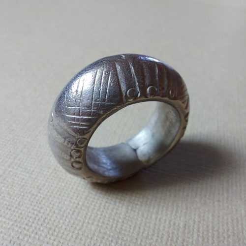 Old Tuareg silver ethnic ring with patterns from Niger