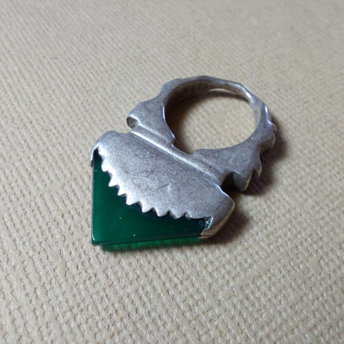 old tuareg hair amulet or talhakimt hair ring adornment or hair jewelry in silver with inset bohemian green glass from niger