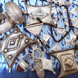 Silver Tuareg tcherot amulets, Tuareg Tchatchat necklaces, Agadez and Iferouane cross pendants, Tuareg In'Gall cross pendant, Fulani or Peul silver hair adornment pendants.
