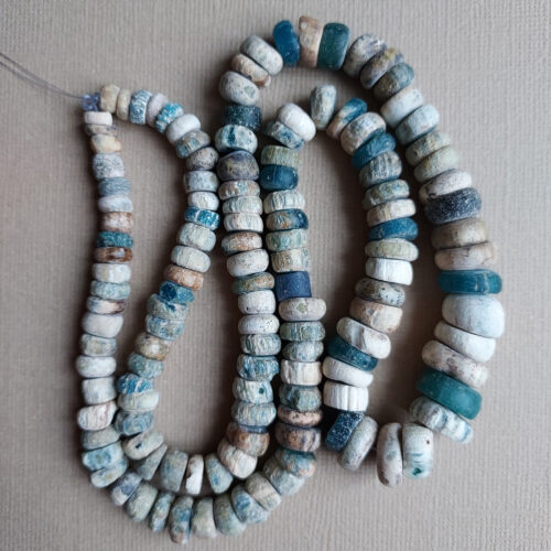 Ancient Nila glass beads with rich iridescent patina from Mali.