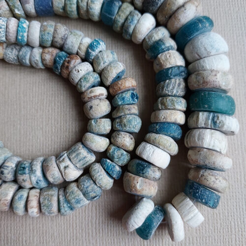 Ancient Nila glass beads with rich iridescent patina from Mali.