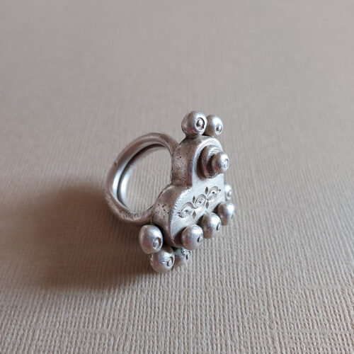 Old Fulani silver statement ring in the shape of a heart.