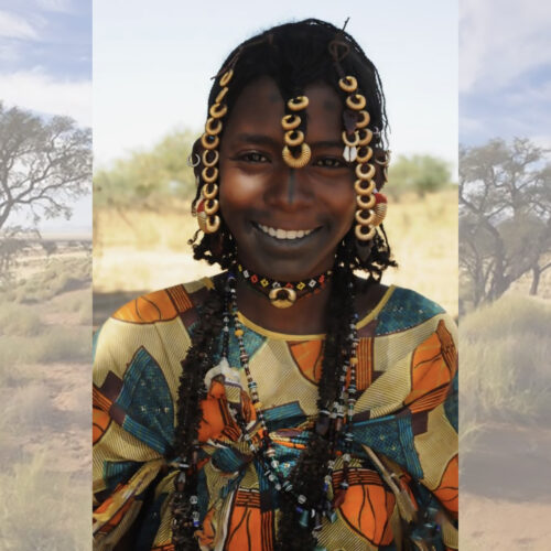 Old Fulani girl with silver adornments.