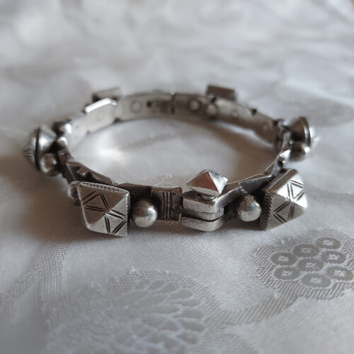 Old articulated silver Mizam Guedra bracelet from southern Morocco.