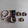 Ethnic earrings, pendant and hair rings all made of silver.