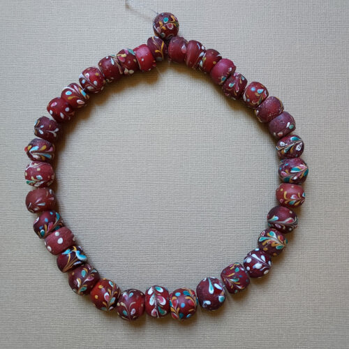 Antique Venetian decorated trade beads with trail decoration.