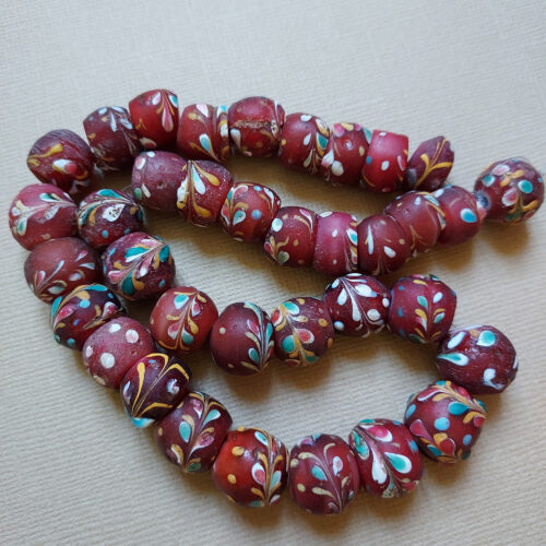 Antique Venetian decorated trade beads with trail decoration.