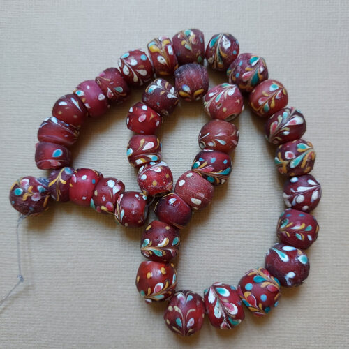 Antique Venetian decorated trade beads with trail decoration.