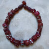 Antique Venetian red eye beads from the African trade.